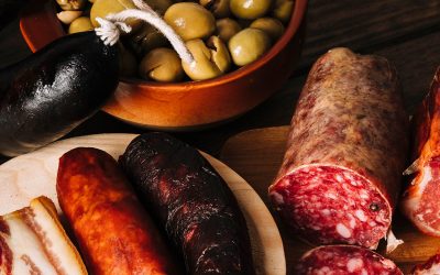 smoked-sausages-near-pickled-olives